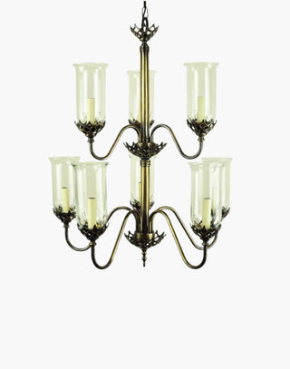 Gothic Eight Arm Chandelier in cast brass, inspired by a 19th-century chandelier from County Cork, Ireland. Includes Clear Storm Glasses, 19.5″ of chain, and ceiling hook, ideal as a statement centerpiece in historic or private residences.