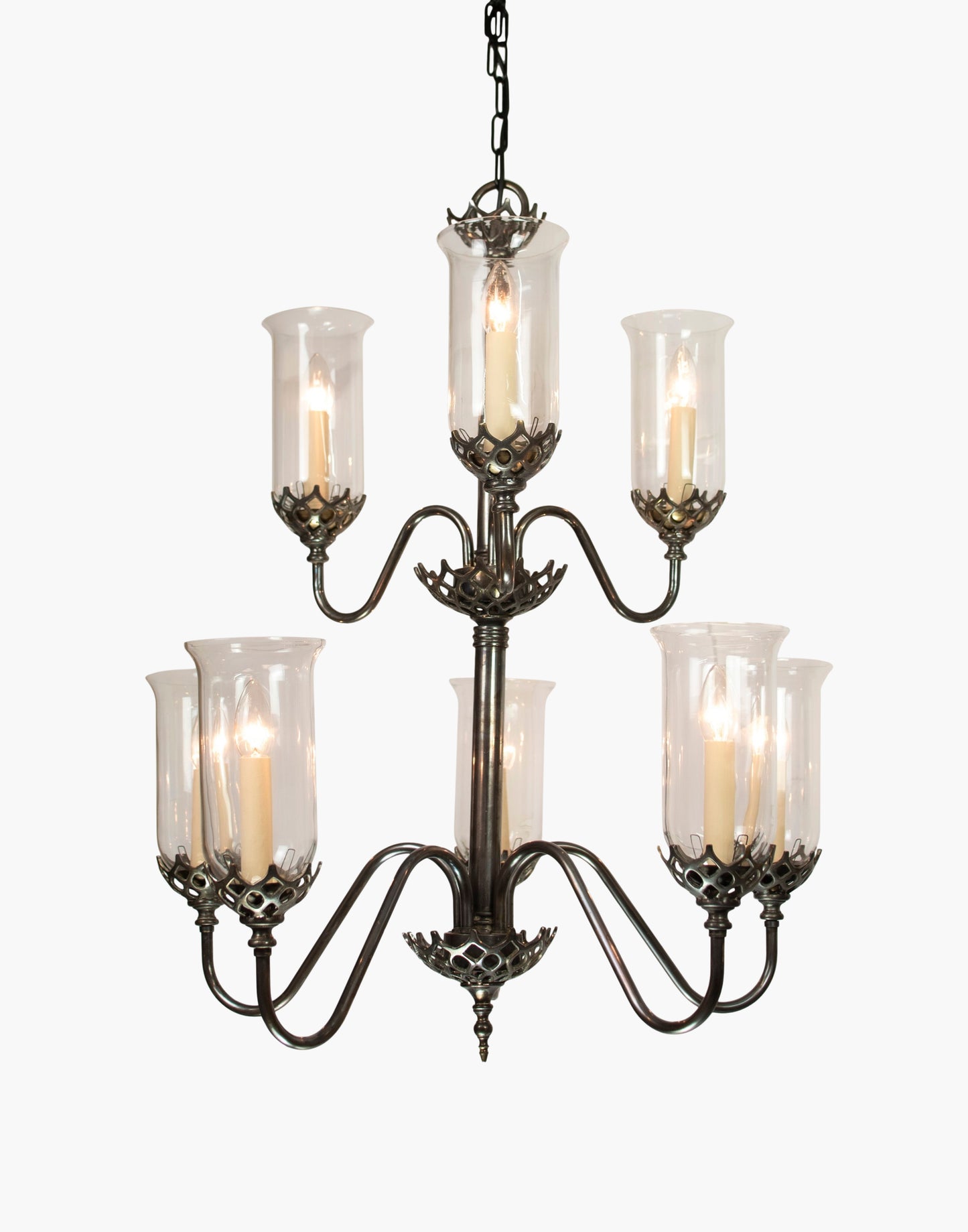Eight arm chandelier in cast brass with clear storm glasses, statement period ceiling light inspired by an 1800 Irish church original.