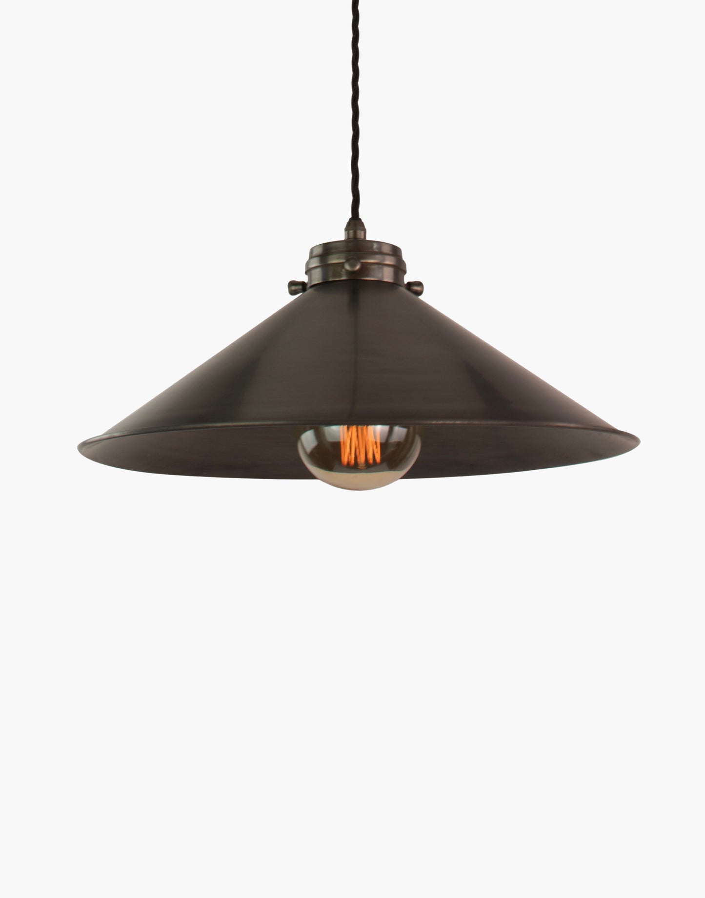 Brass pendant light with adjustable height and silk flex, focused illumination for kitchen islands and interior spaces