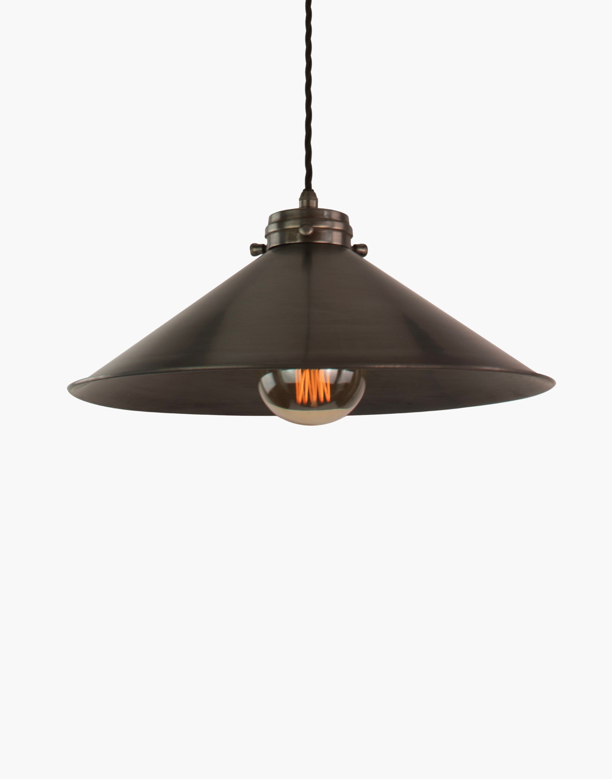 Brass pendant light with adjustable height and silk flex, focused illumination for kitchen islands and interior spaces
