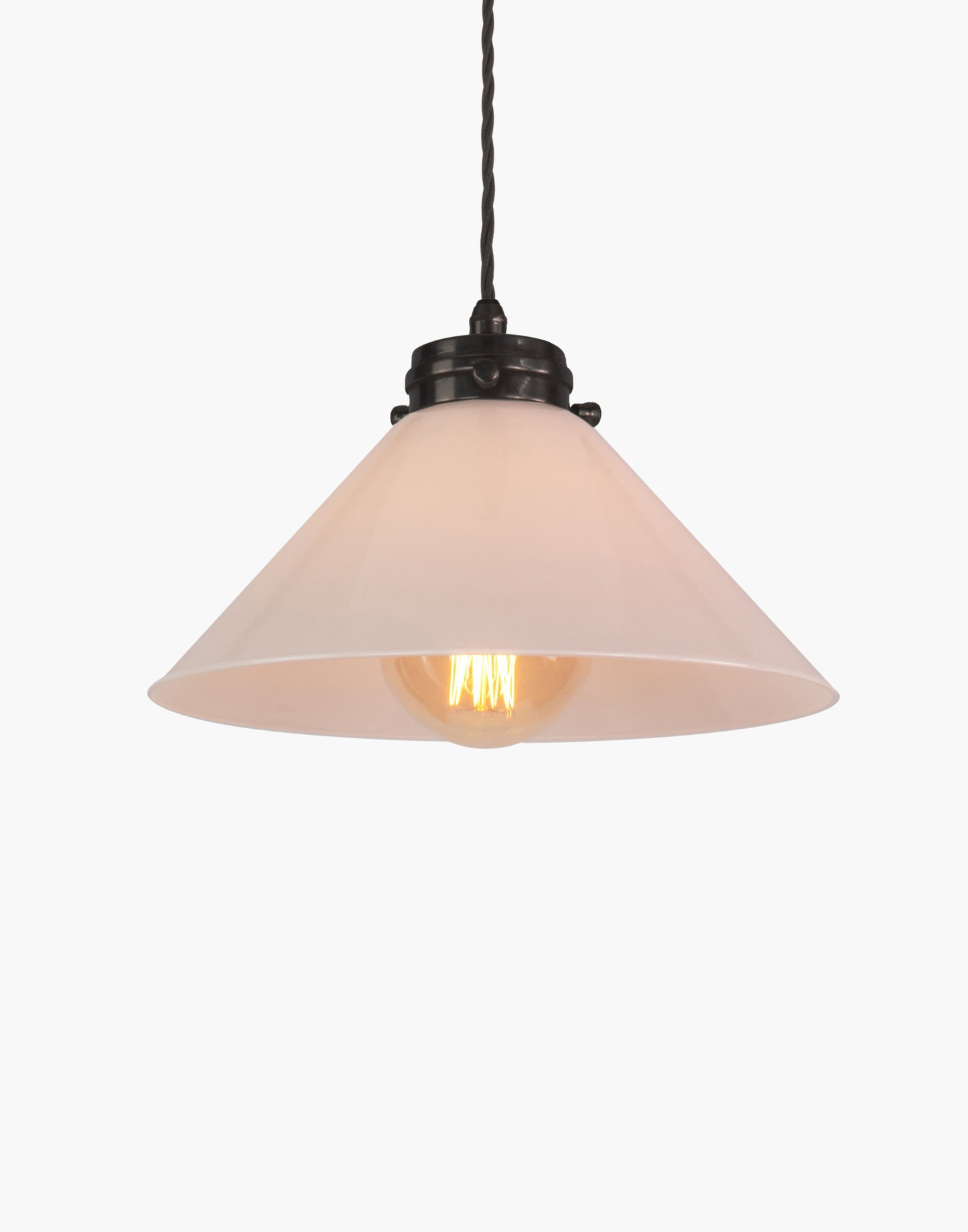 Pendant light in solid brass with classic silhouette, adjustable height, and refined transitional design for interior spaces