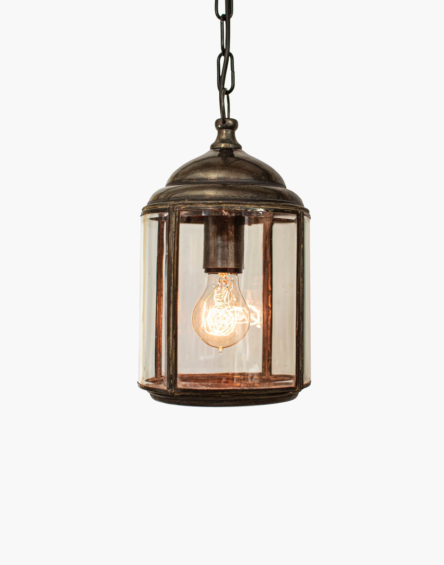 Solid brass pendant lantern with mouth-blown curved beveled glass, traditional porch hanging light with brass chain and ceiling rose.