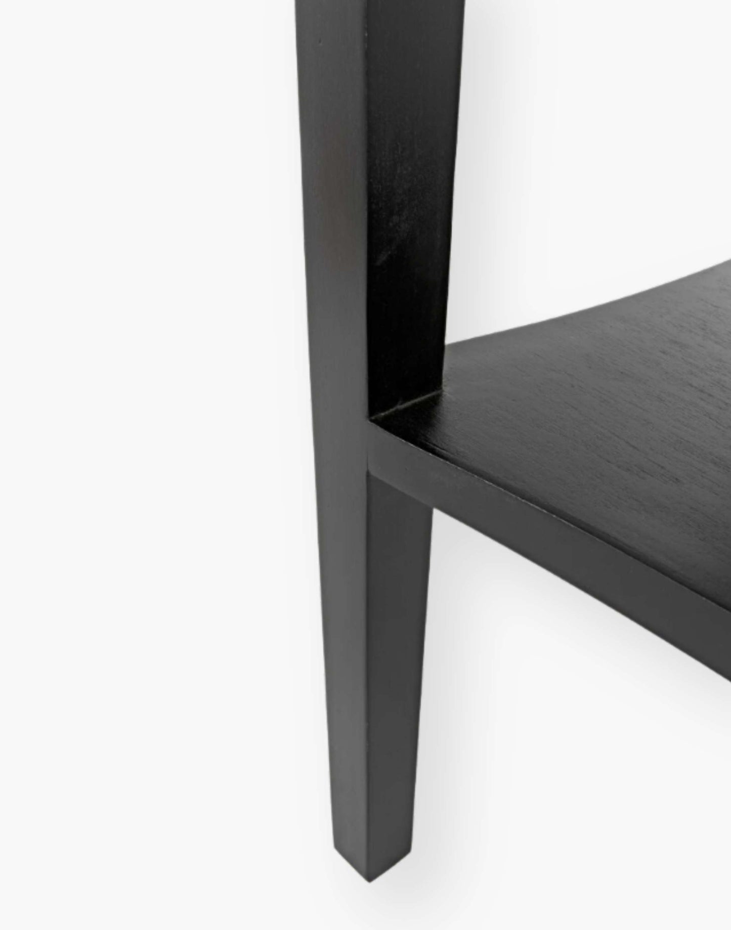 Weathered Black Solid mahogany side table with tapered legs and decorative carvings. Perfect for living rooms or bedrooms.