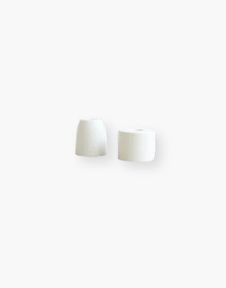 wo white petite taper candle holders.