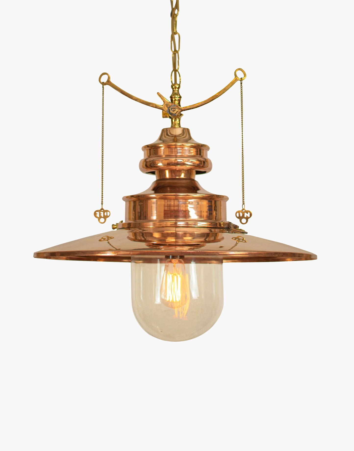 pendant light in solid copper with brass details and clear or opal glass shade