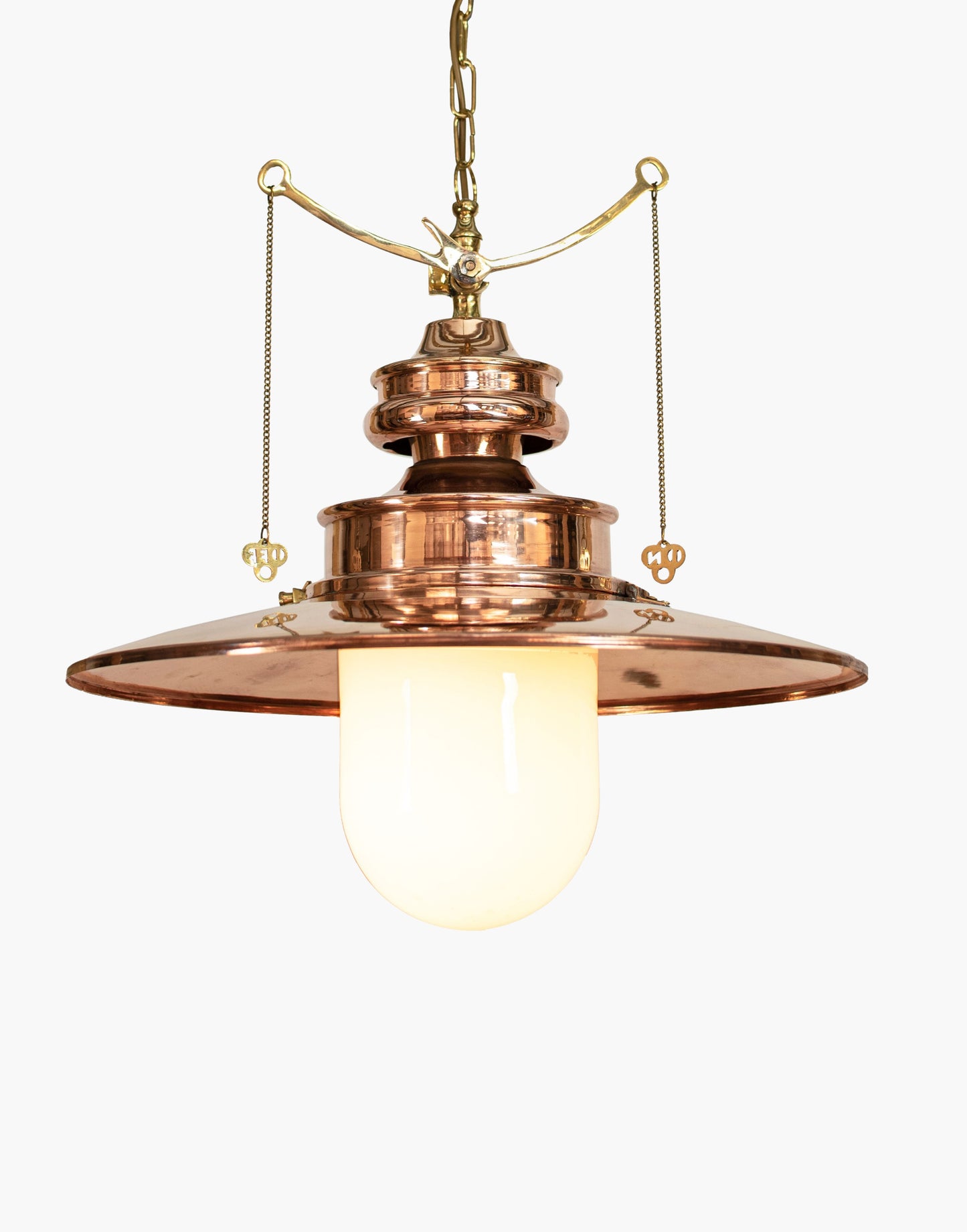 pendant light in solid copper with brass details and clear or opal glass shade