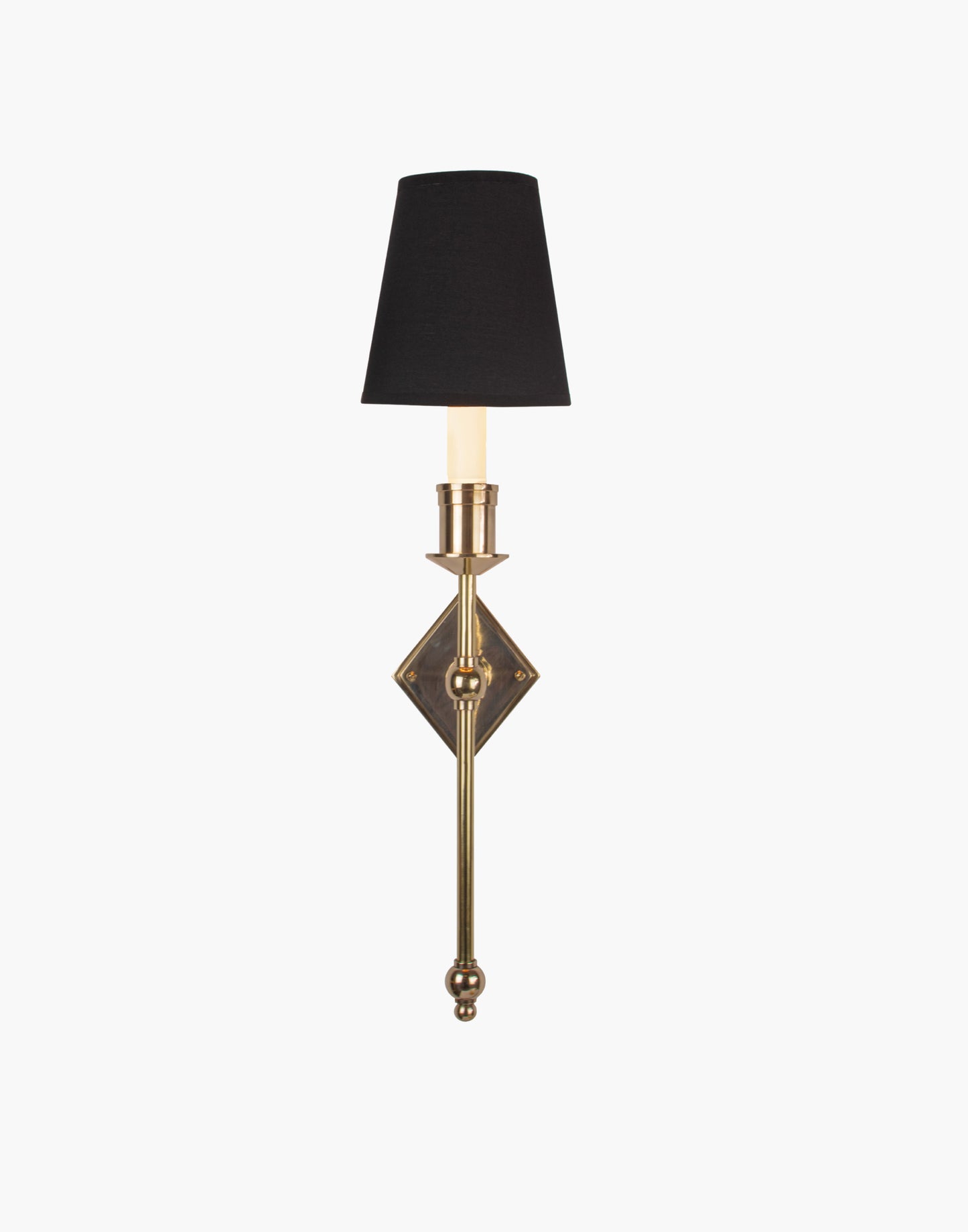 Wall sconce in cast and machined brass with diamond-shaped scalloped backplate and optional shade.