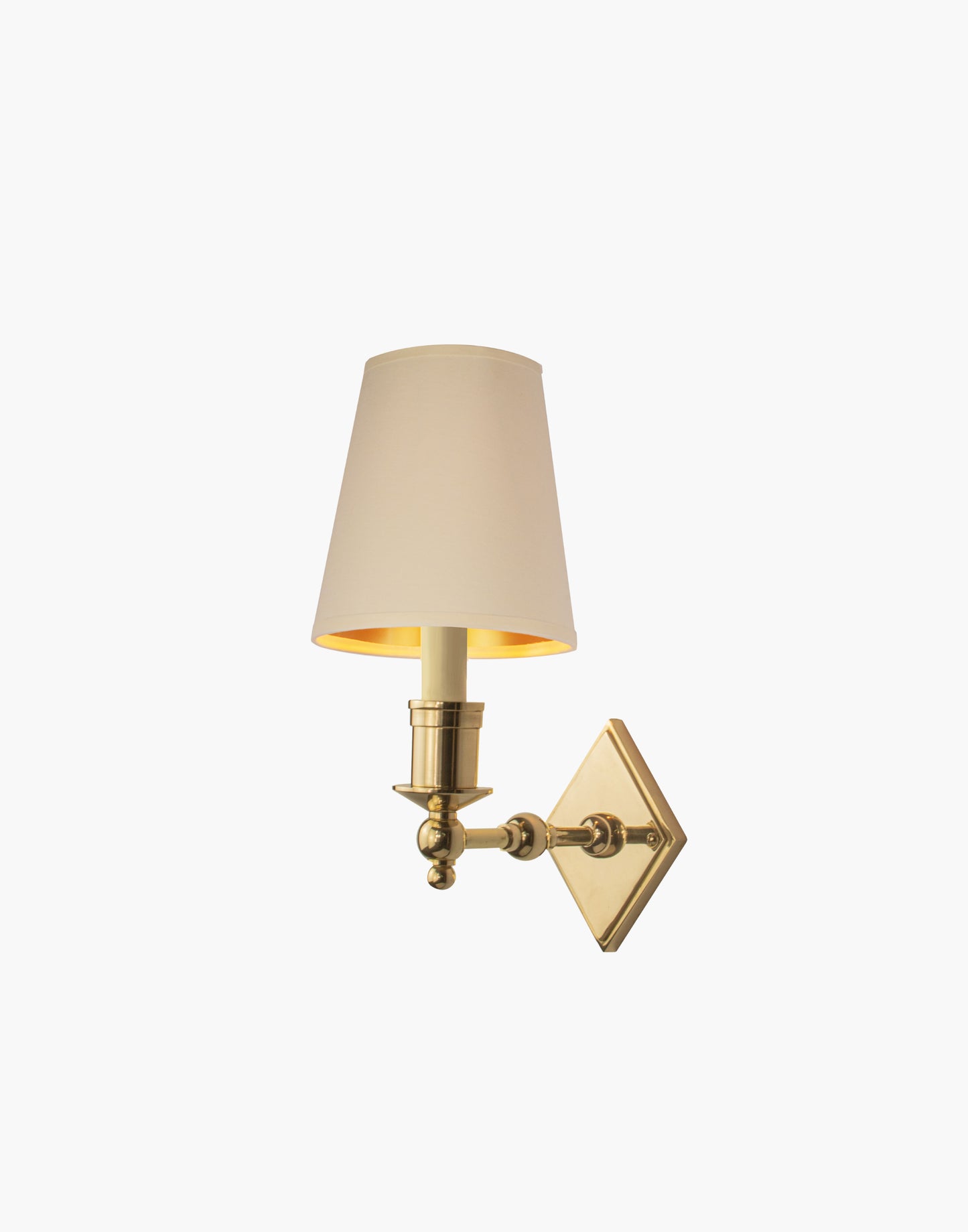 Brass wall sconce with diamond-shaped scalloped backplate and optional shade, cast and machined brass wall light.
