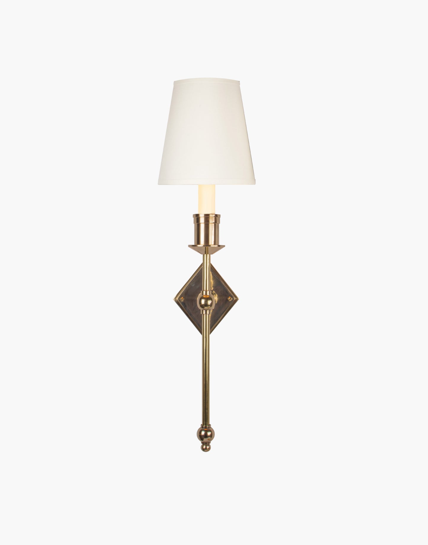 Wall sconce in cast and machined brass with diamond-shaped scalloped backplate and optional shade.