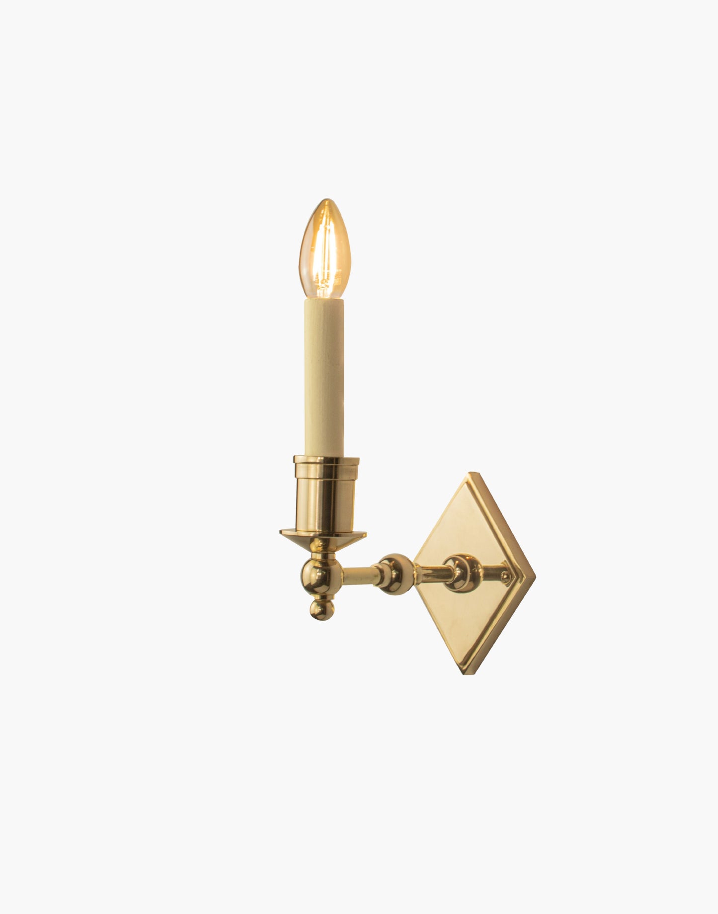 Brass wall sconce with diamond-shaped scalloped backplate and optional shade, cast and machined brass wall light.