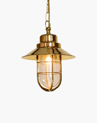 Wheelhouse Nautical Pendant in solid brass with clear glass. Inspired by ship lights from 1910, perfect for nautical-themed interiors.