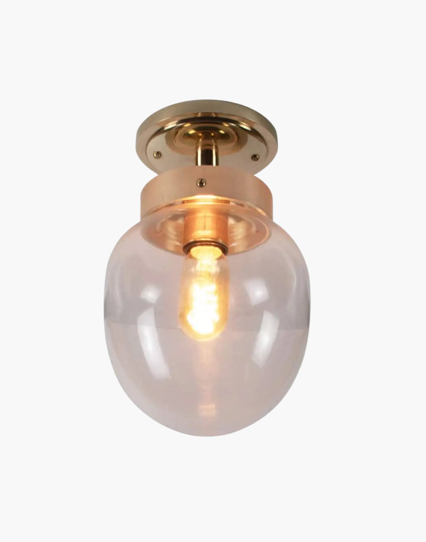 Charleston Flush Light in solid brass with mid-century design, available in five finishes with clear or opal glass. IP44-rated for Zone 2 bathrooms and covered outdoor areas.