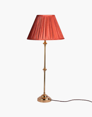 Polished Lacquered Finish with Coral Shade Provencal table lamps: simple, solid brass narrow lamps ideal for console or side tables.