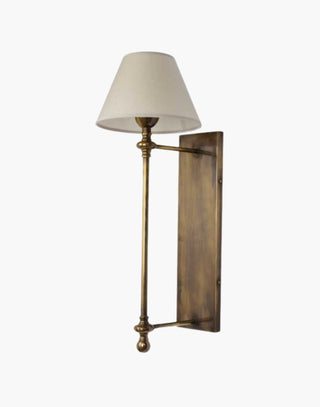 Distressed Finish with Natural Silk Shade Provencal wall lights: Elegant cast brass fixtures inspired by 19th-century French design. Customizable shades available.