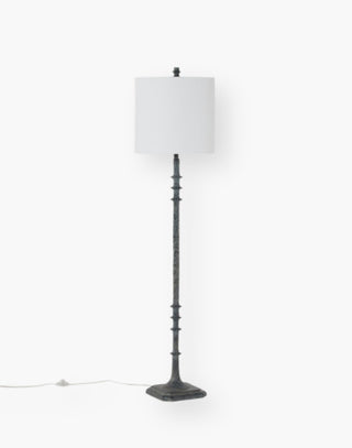 Dark Gray Resin modern floor lamp with spindled rod and a notched square base.