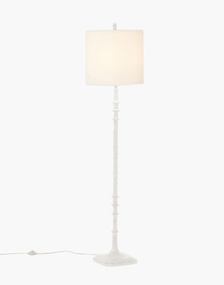 Matte White Resin modern floor lamp with spindled rod and a notched square base.