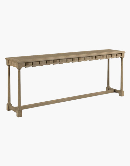 Coastal console table with seaside finish featuring intricate fretwork on both sides and a center stretcher, perfect as a sofa table or a floating entryway accent piece.