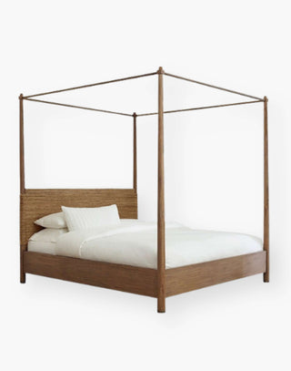 Canopy bed made of abaca, teak, and bronze accents