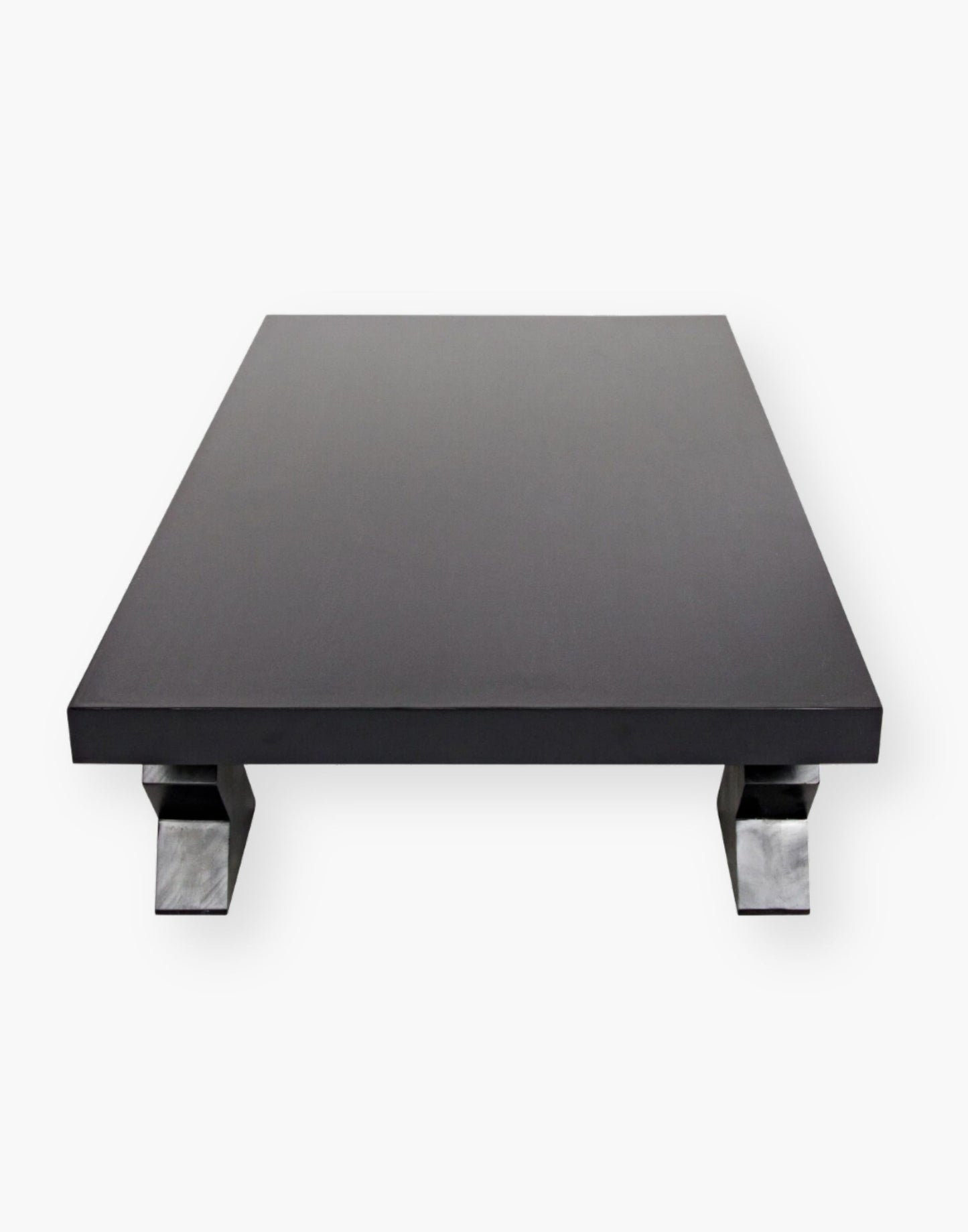 Solid Wood rectangle coffee table supported with 4 legs with a geometric zig zag cut out design in a hand rubbed black finish
