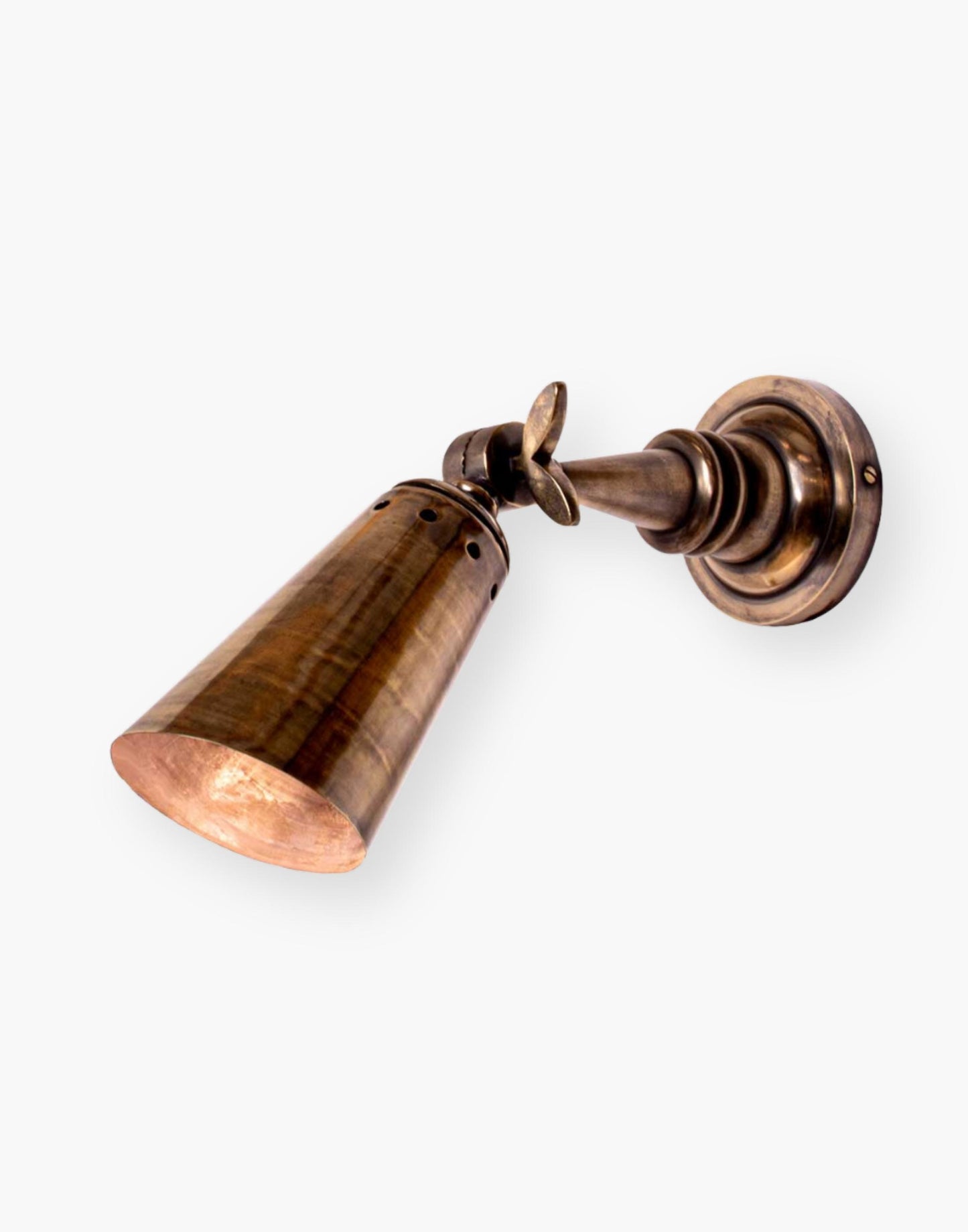 Wall Light in Heavy Machined Brass. Adjustable vertical swivel. Available in various finishes with optional wall plate push switch