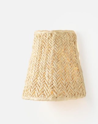 Hand-woven into a chevron pattern, natural raffia relaxes the formality of a traditional straight empire shade.