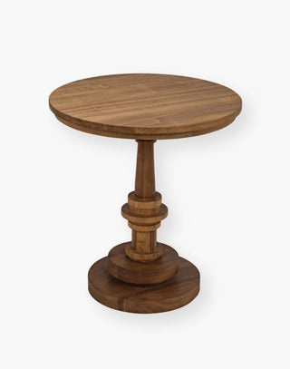 Hand-carved of solid teak side table features a circular base with coordinating round top