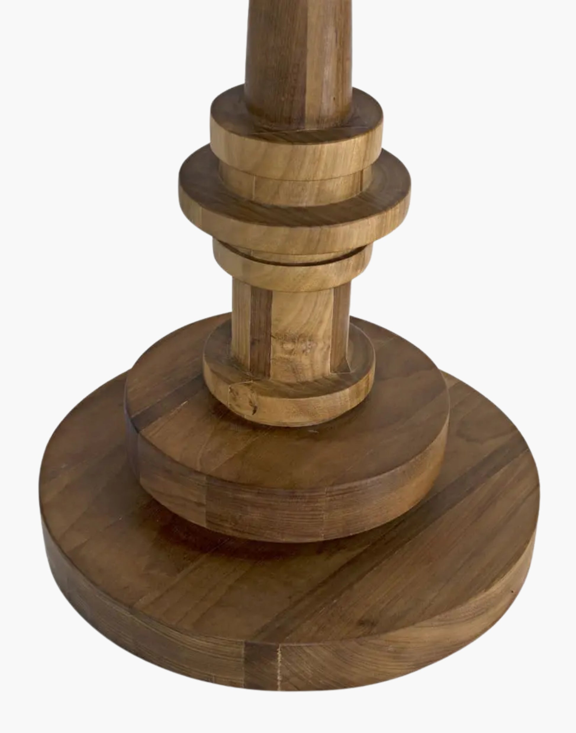 Round teak side table with gold finish and turned pedestal base, sculptural modern design