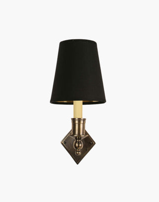 Distressed finish with d6g black shade, elegant solid brass sconce with diamond backplate. Perfect for modern or traditional interiors.