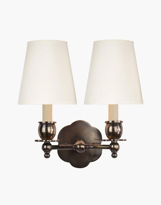 Distressed Finish with D6 White Shade India Rose Sconces: Solid brass petal design. Versatile for contemporary or traditional settings.