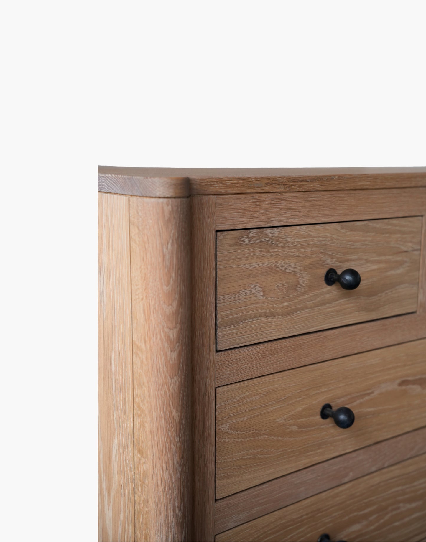 Handcrafted white oak nightstand with soft-close drawers, natural hardwax oil finish, and USB-C charging dock.