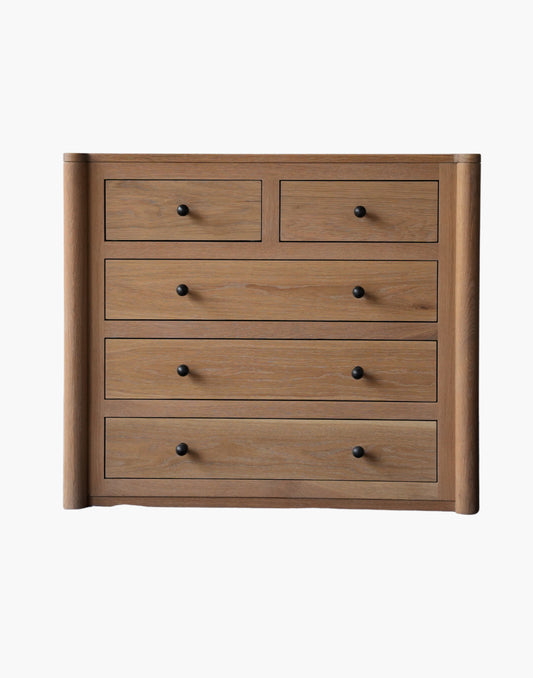 Handcrafted white oak nightstand with soft-close drawers, natural hardwax oil finish, and USB-C charging dock.