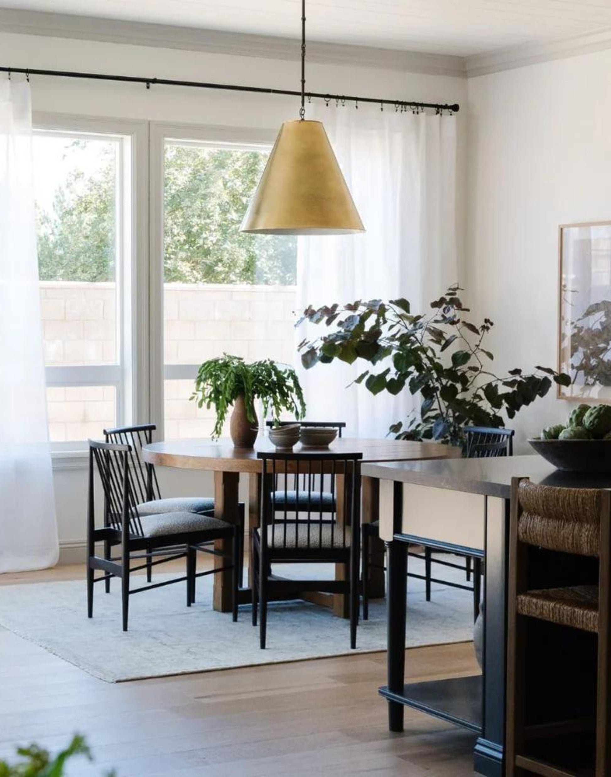 Neutral Timberland Rug - Green-Gray & Cream Hues, Vintage Motifs. Transitional Statement for Your Space. dining room setting.