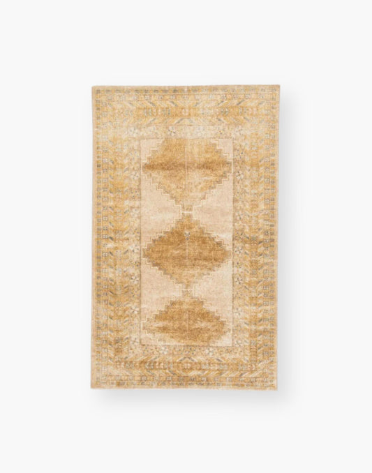 mustard and yellow toned handwoven wool rug