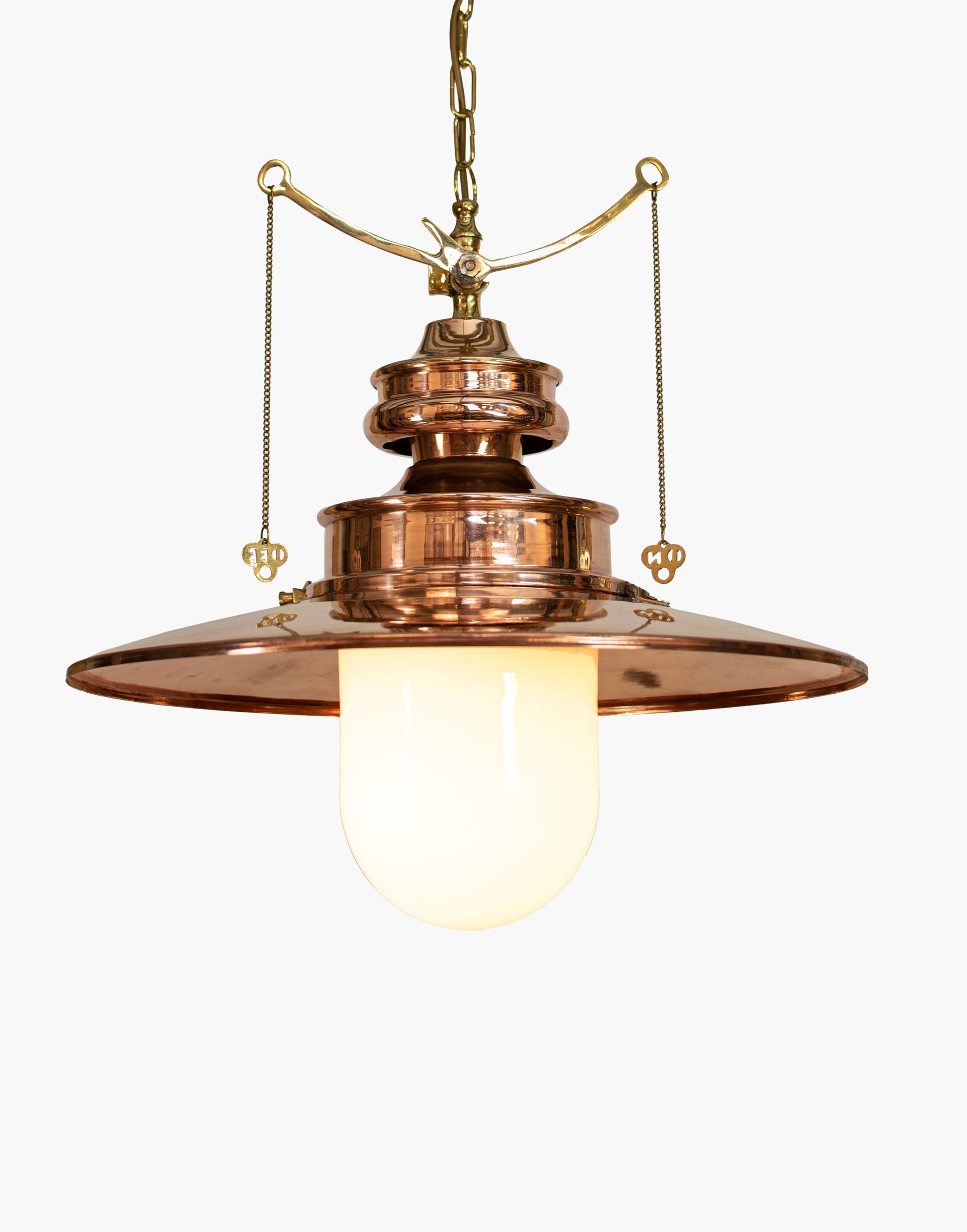 pendant light in solid copper with brass details and clear or opal glass shade