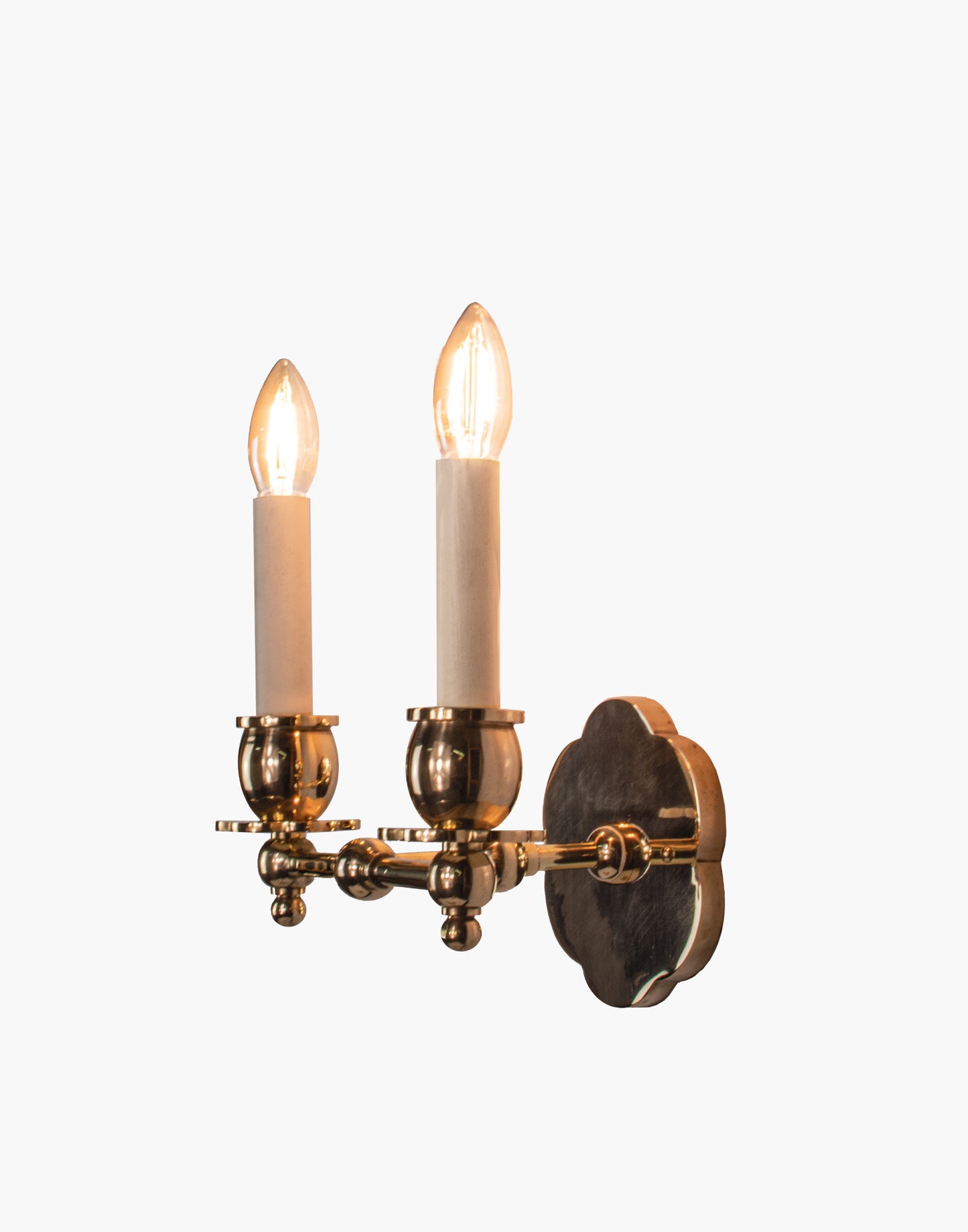 Twin Wall Sconce in solid brass with petal-shaped backplate and optional D6/D6G shades, transitional style for traditional and contemporary interiors.