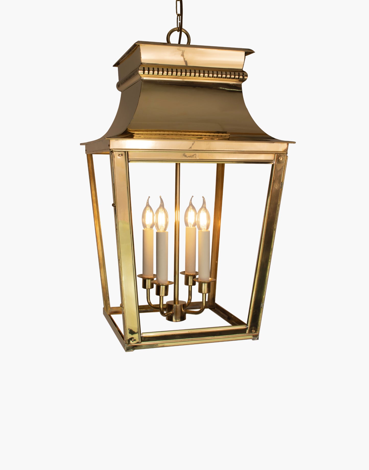 Hanging lantern in solid brass with intricate fretwork, French-inspired damp-rated porch or hallway pendant.