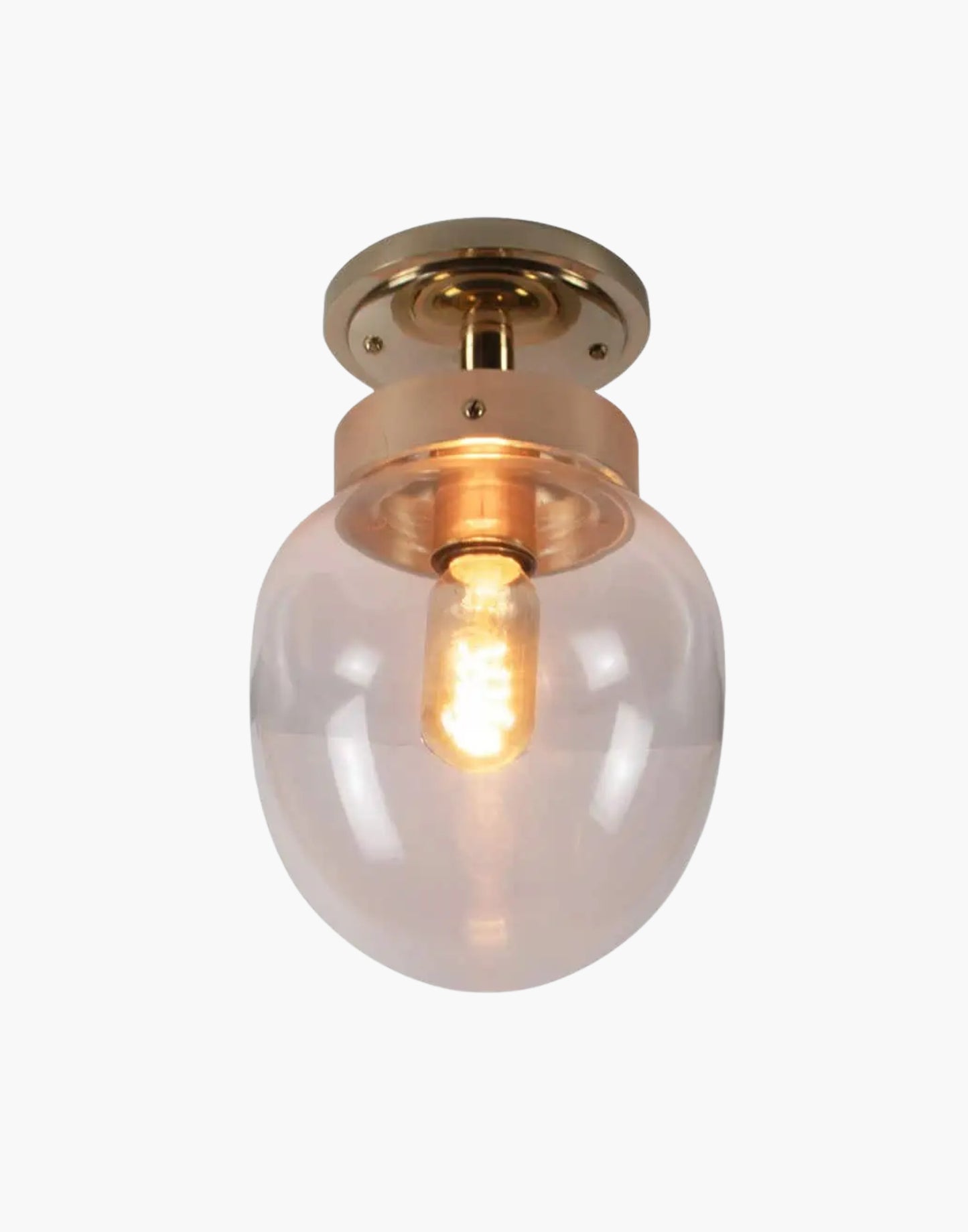 Charleston Flush Light in solid brass with mid-century design, available in five finishes with clear or opal glass. IP44-rated for Zone 2 bathrooms and covered outdoor areas.