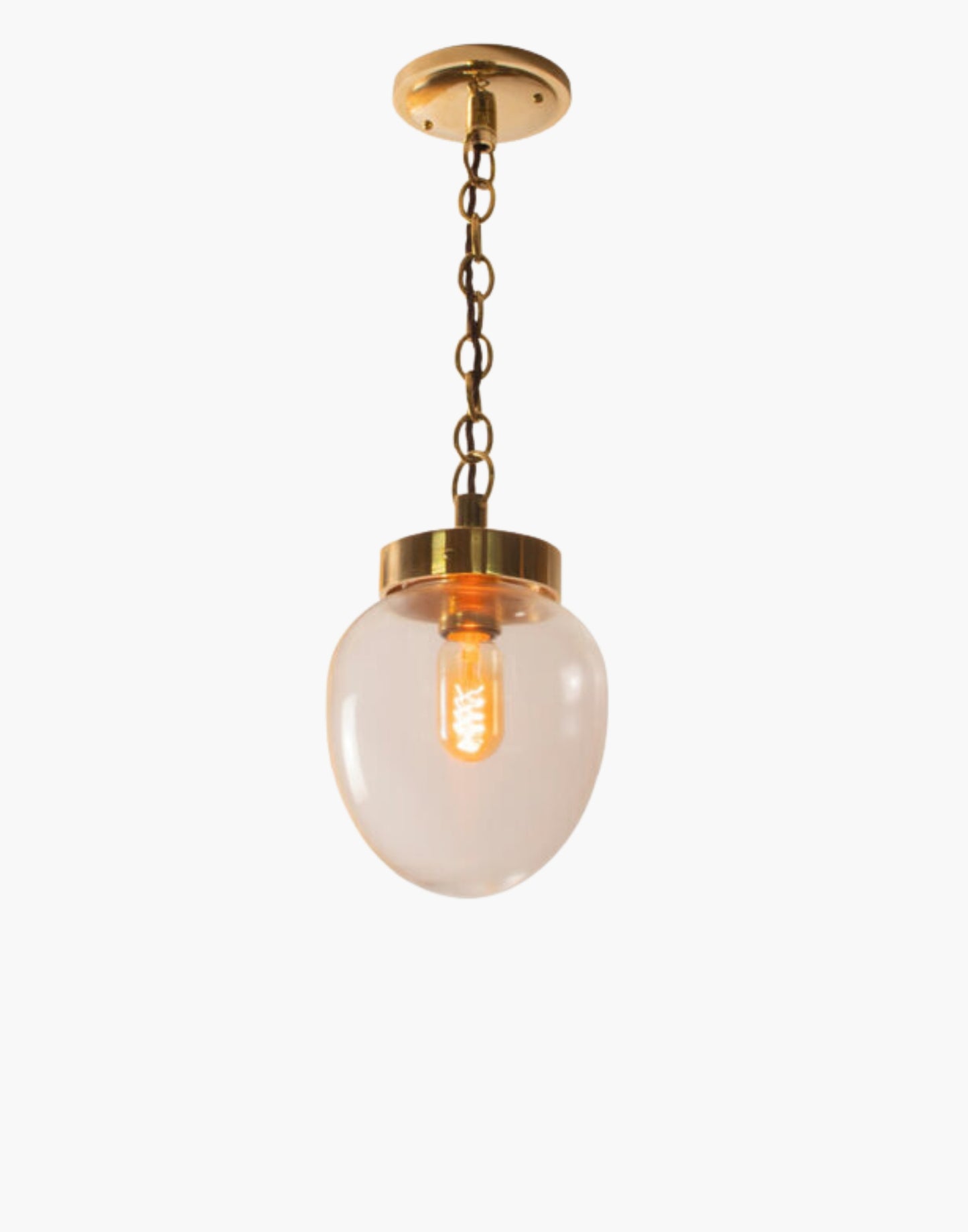 The Charleston Pendant Light solid brass light with mid-century design, available in five finishes with clear or opal glass. IP44-rated flush version suitable for Zone 2 bathrooms. Hanging and flush options for covered outdoor areas.
