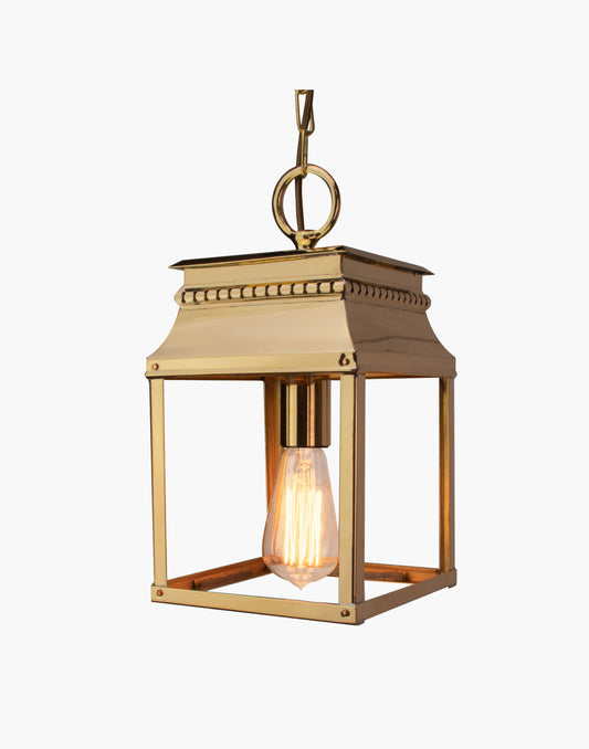 Bordeaux hanging lantern in solid brass with French 19th-century–inspired fretwork, ceiling lantern for hallways, stairwells, or over-counter lighting, suitable for interior or exterior use.