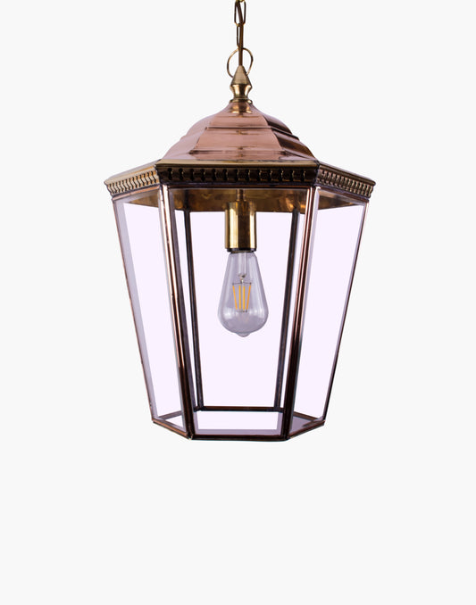 Pendant lantern in solid copper with brass detailing and beveled glass, traditional hall or porch hanging light.