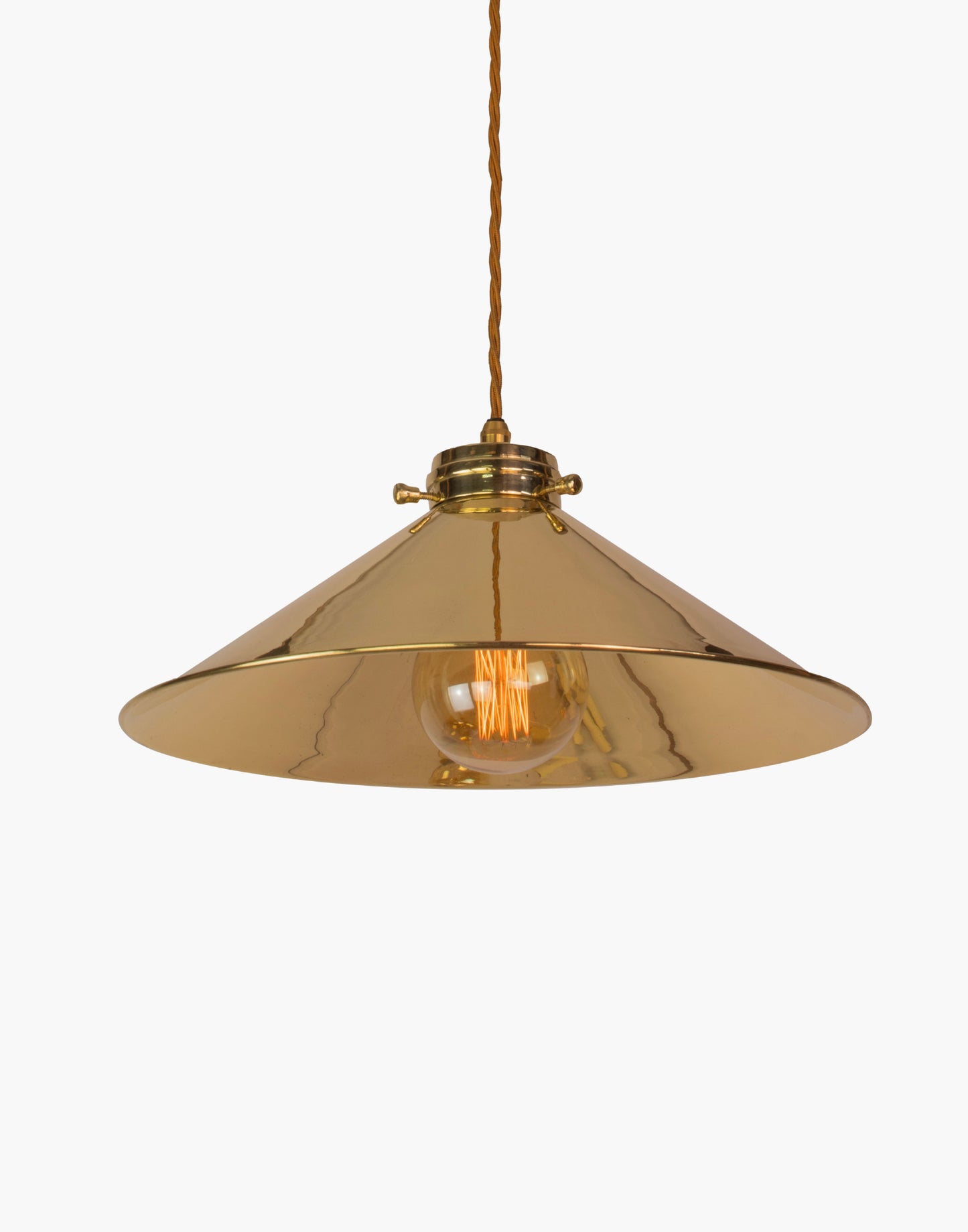 Brass pendant light with adjustable height and silk flex, focused illumination for kitchen islands and interior spaces