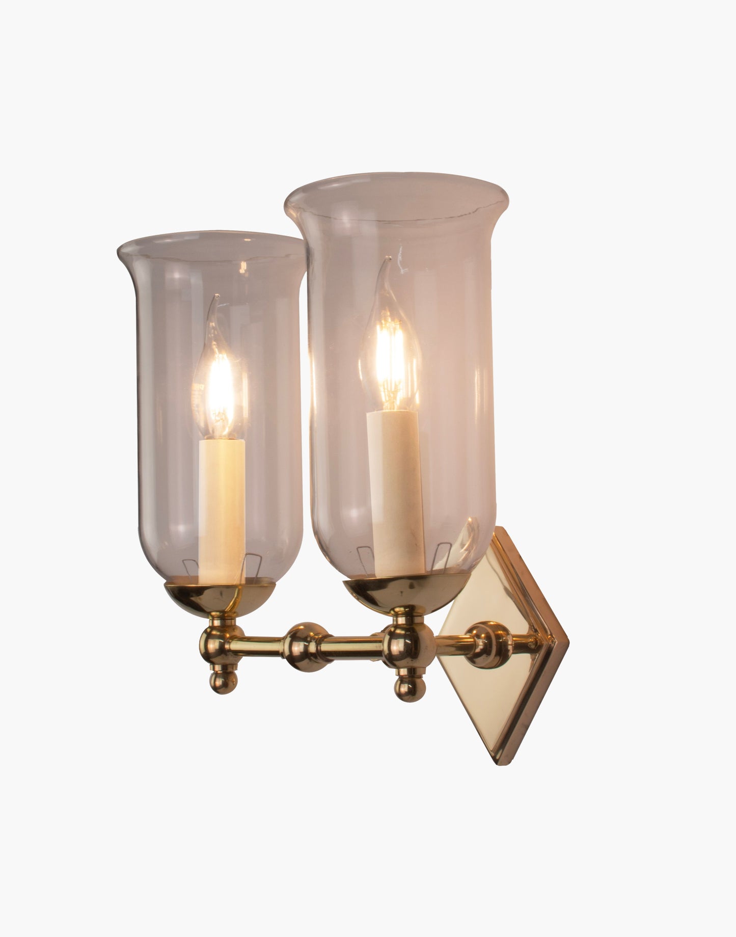 Storm Glass wall sconce twin in brass with diamond back plate, scalloped edge, and rustic storm glass shades for bathroom or interior lighting