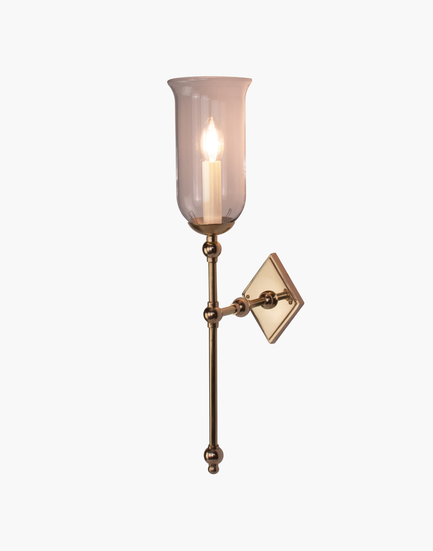 Tall Storm Glass brass wall sconce with elongated profile and rustic glass shade, ideal for bathroom or interior lighting