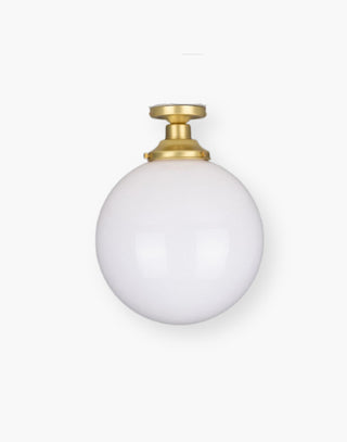Semi-Flush Ceiling Light with an Opal Glass Shade in Satin Brass.