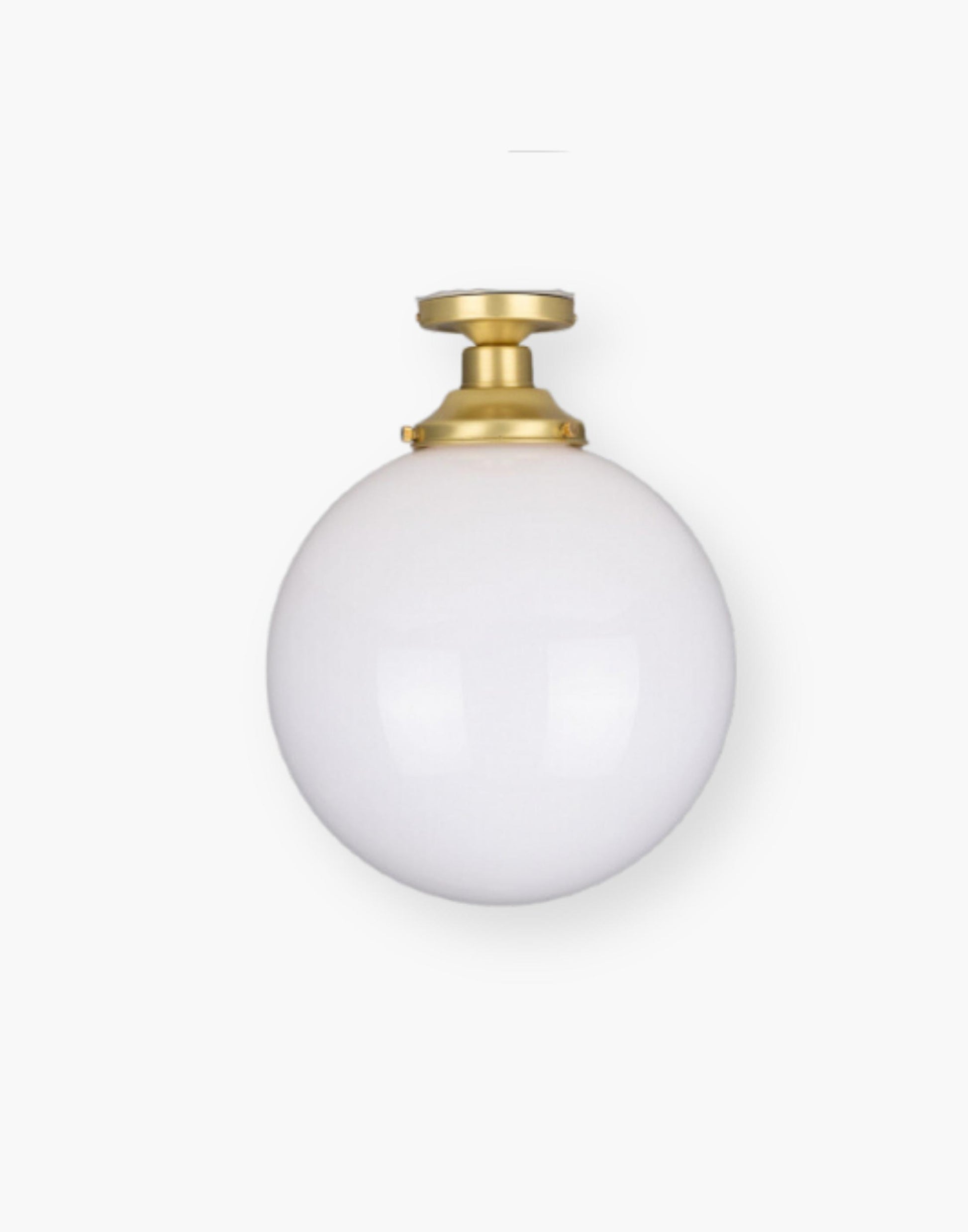 Semi-Flush Ceiling Light with an Opal Glass Shade in Satin Brass.