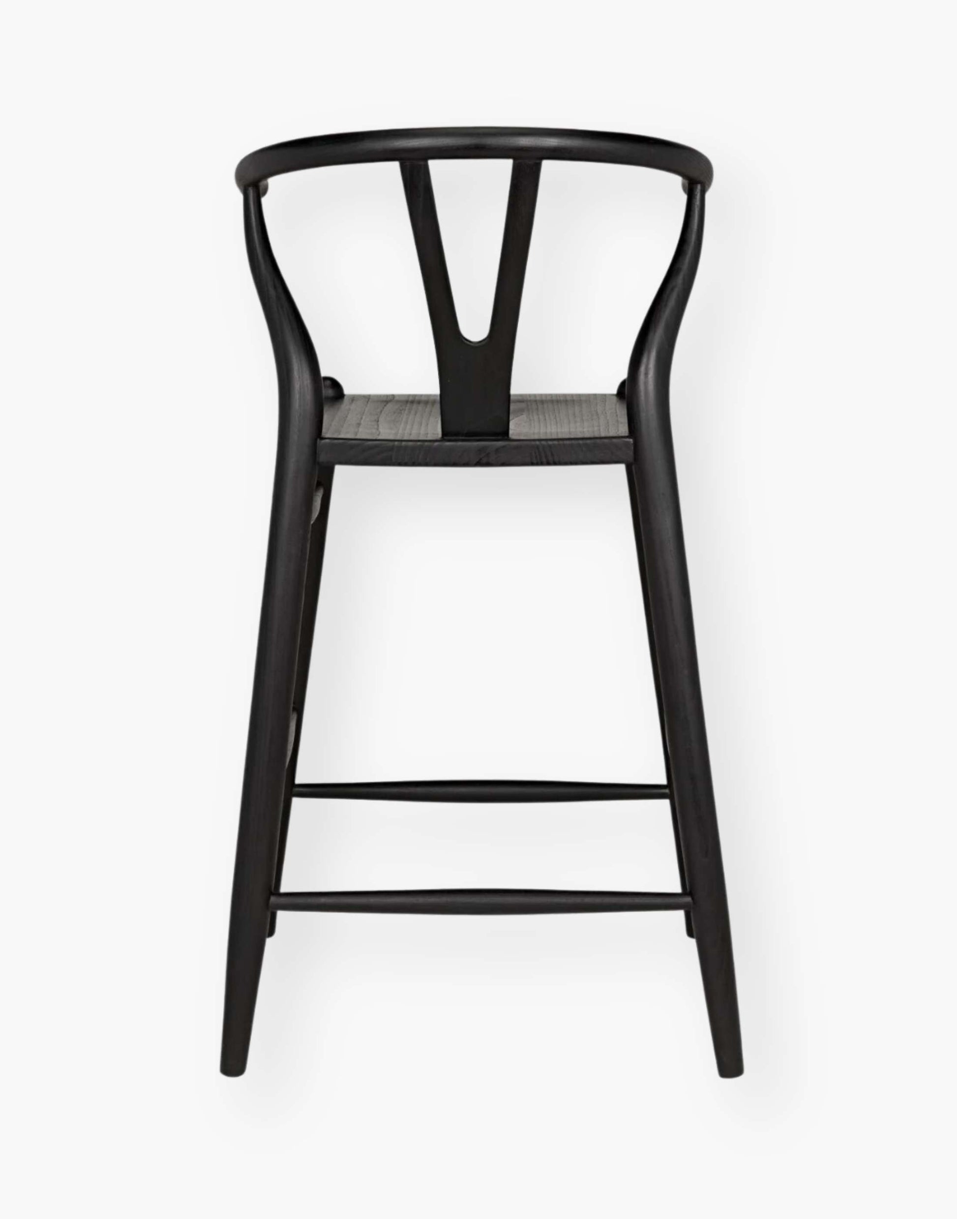 Counter stool that is hand-carved of sungkai wood with a charcoal black finish.