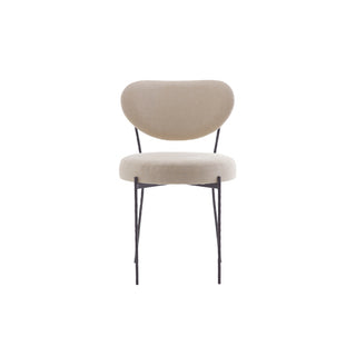 Upholstered dining chair with a hammered iron frame and a linen wrapped seat and backrest.